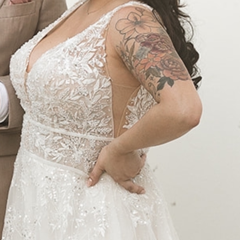 Madeline Gardner Tulle Ivory Wedding Dress: Sleeveless V-neck A-line
